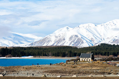 Scenic view of snowcapped mountains against sky