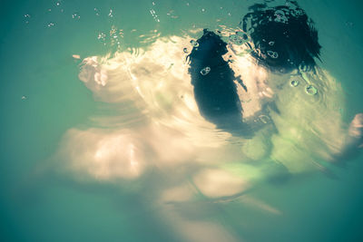 High angle view of person swimming in sea