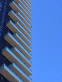 Low angle view of buildings against clear sky