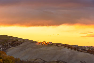 Scenic view of dramatic sky during sunset