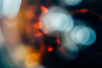 Defocused image of illuminated lights at night