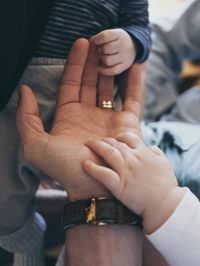 Close-up of people holding hands