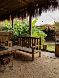 Gazebo on beach against trees