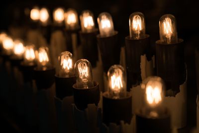 Close-up of illuminated lights in temple