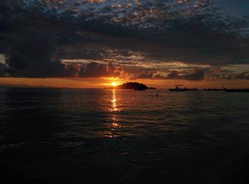 Scenic view of sea against sky during sunset