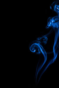 Smoke against black background