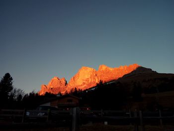 View of illuminated mountain against sky at night