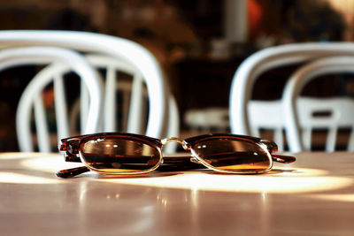 Close-up of sunglasses on table