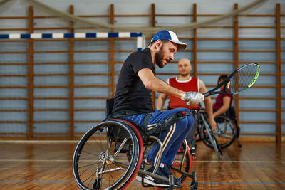 Side view of man with bicycle