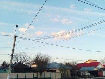 Low angle view of houses against sky