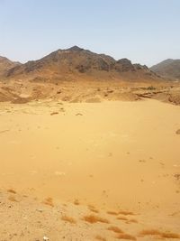 Scenic view of desert against sky