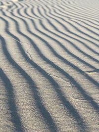 High angle view of shadow on sand