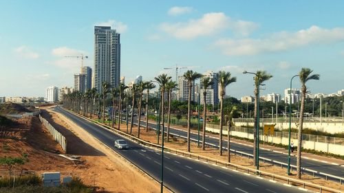 Panoramic view of city buildings against sky