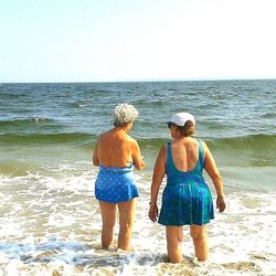 Woman standing on beach