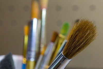 Close-up of paintbrushes in museum