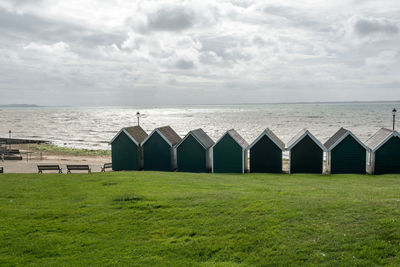 Built structure on beach against sky