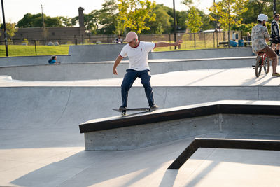 Full length of man skateboarding on skateboard