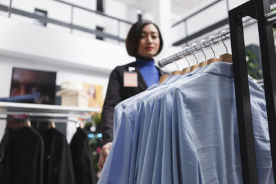 Portrait of woman standing in store