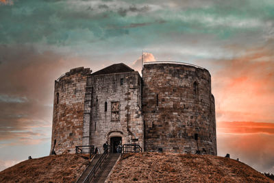 Low angle view of historic building against sky