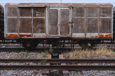 Train on railroad track against sky