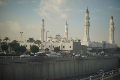 View of city buildings against sky