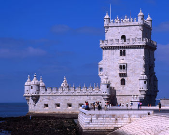 View of historical building against blue sky