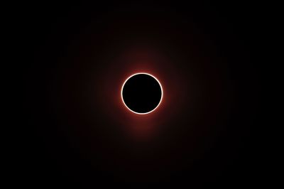 Low angle view of moon against sky at night