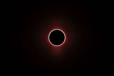 Low angle view of moon against sky at night