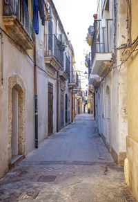 Typical small street on the island of ortigia, syracuse in sicily, italy