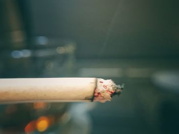 Close-up of cigarette against blurred background
