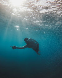 Man swimming in sea