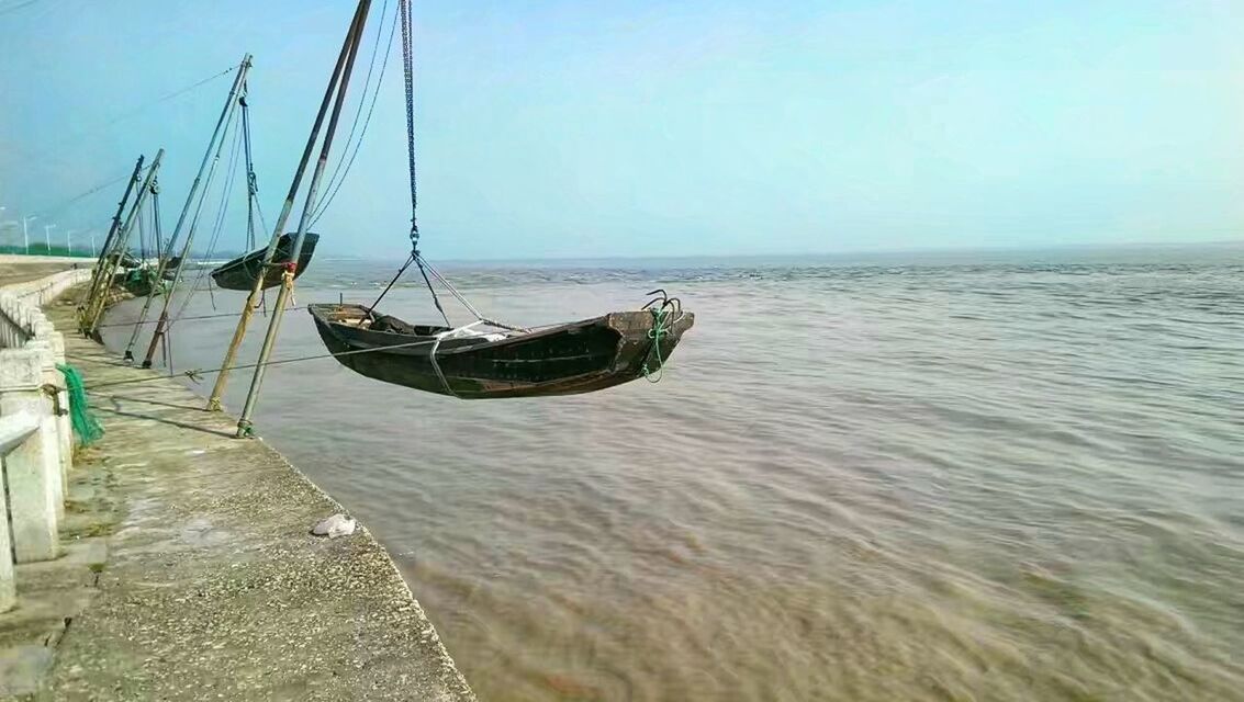 PANORAMIC VIEW OF BEACH AGAINST SKY