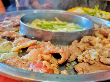 Close-up of meat in cooking pan