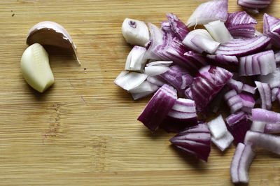 High angle view of chopped vegetables on cutting board