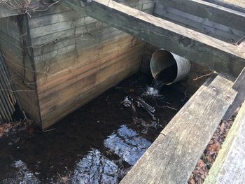 High angle view of old pipe on bridge