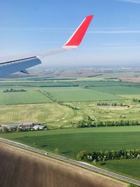 Scenic view of landscape against sky seen from airplane