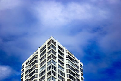 Low angle view of modern building against sky