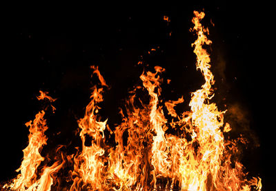 Close-up of fire against black background