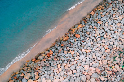 Aerial view of stones at beach