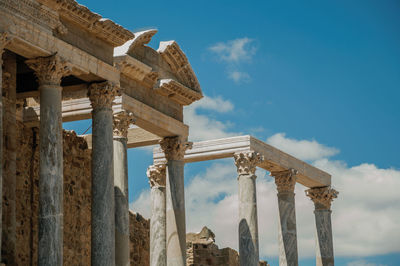 Low angle view of old temple against sky