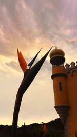 Low angle view of cloudy sky at sunset