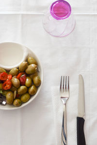 High angle view of eggs in plate on table