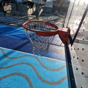 Basketball hoop on city street