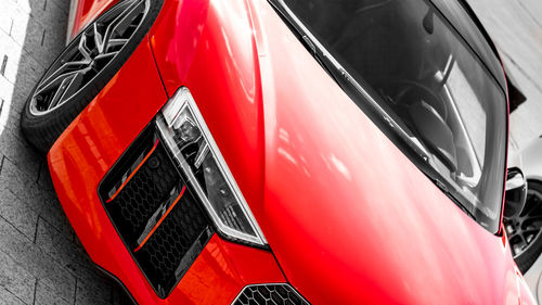 High angle view of red car on glass