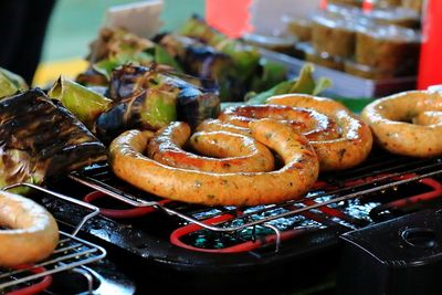 Close-up of meat on barbecue grill