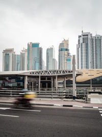 View of city buildings against sky