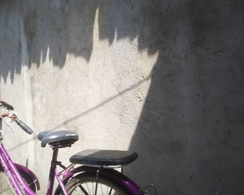 Shadow of bicycle on wall