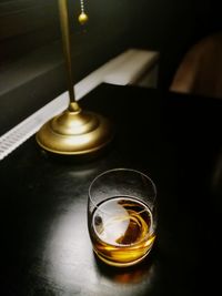 High angle view of illuminated lamp on table