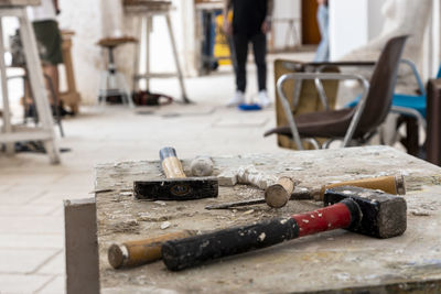 Close-up of hammer on wood