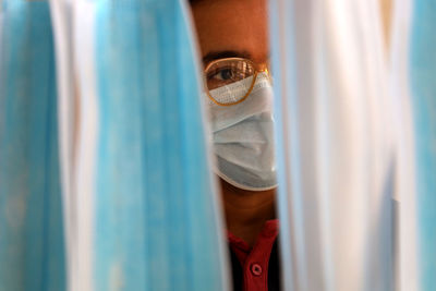 Close-up of human eye with protective mask